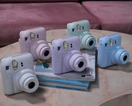 Instax Fujifilm Mini 12 in all available colours on a table