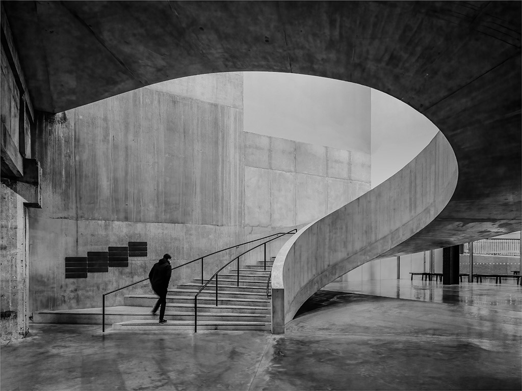 turbine halls in tate modern person walking up the spiral steps black and white apoy 2023 best winners