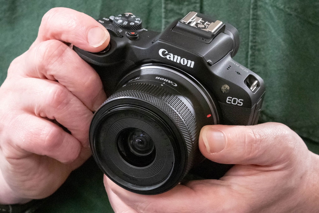 Canon EOS R100 in-hand