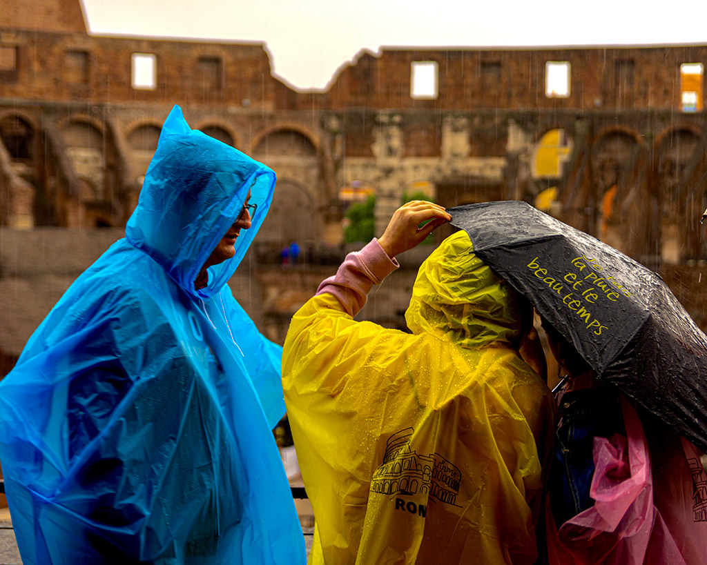 A very wet day at the Colosseum, the wonderfully bright colours of this family’s rain ponchos 