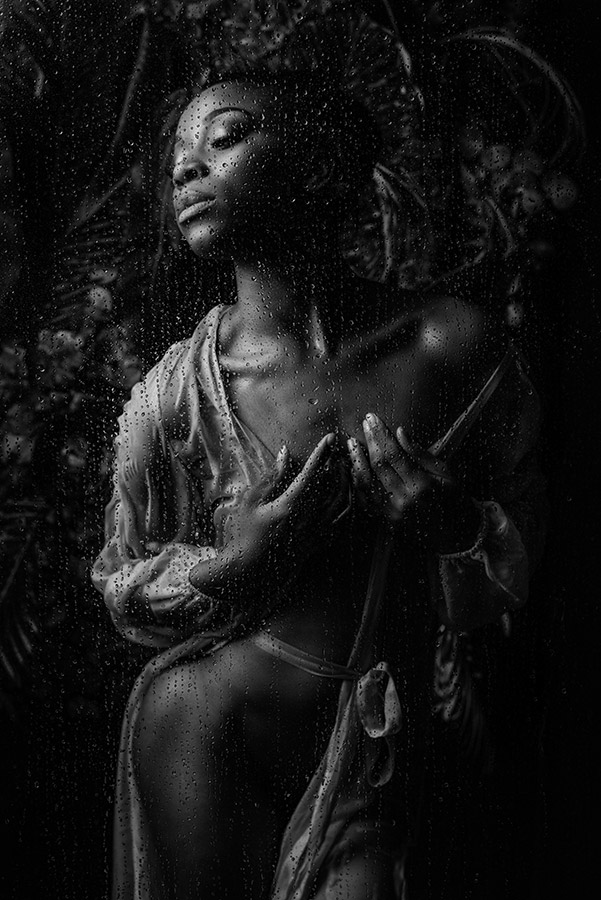 Tianna Williams poses in shower scene on boudoir photo shoot