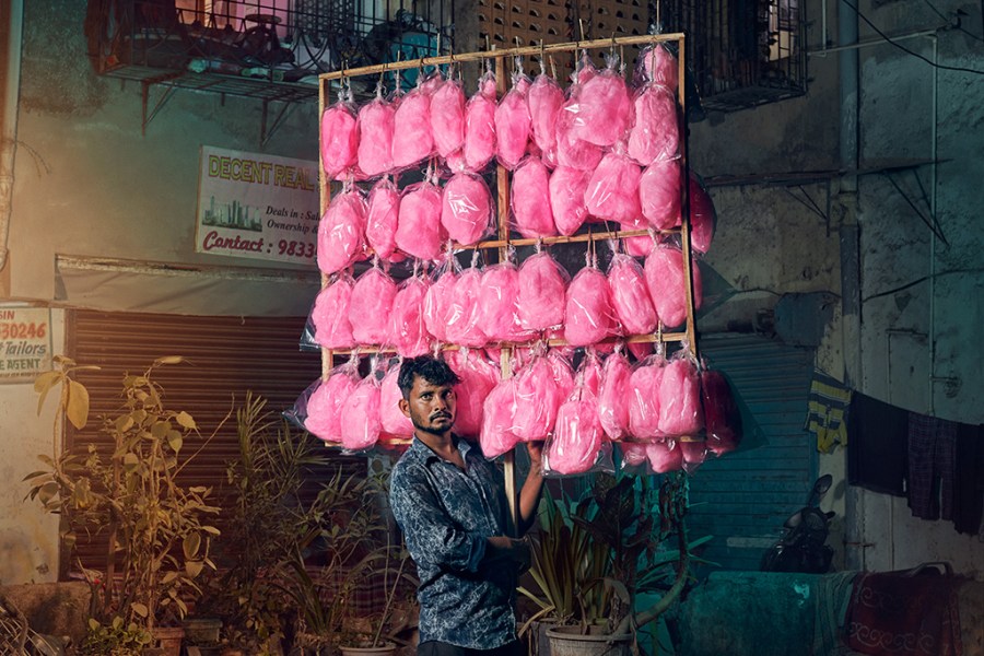 Pappu Jaiswal, a candy floss seller in Mumbai, India, on the streets near to Versova Beach