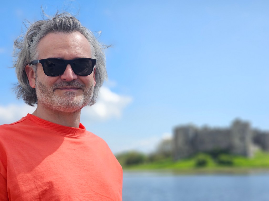 Sample photo taken with Samsung S23 Ultra in Portrait Mode, man in sunglasses and red t-shirt