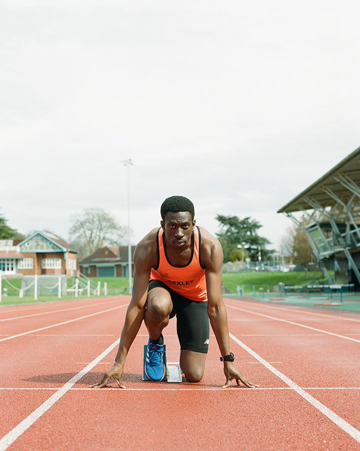 portrait of Ethan Akanni hurdler at starting position for seen in sport portrait