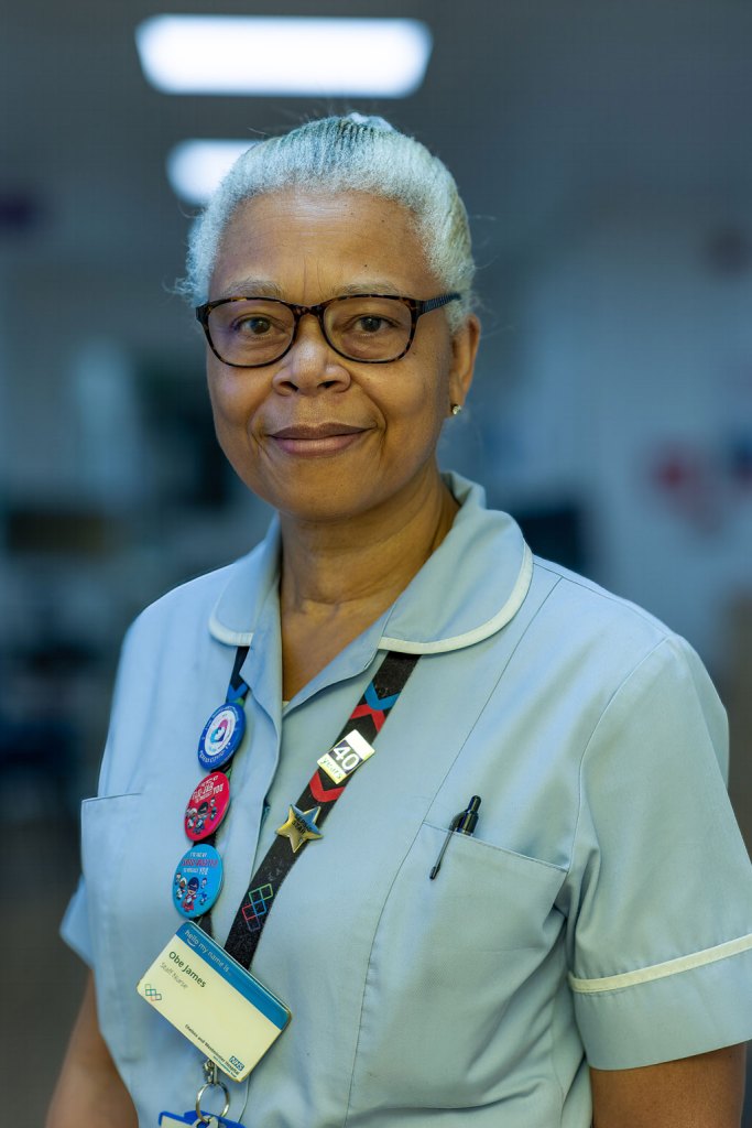 NHS photography competition winners, Emmanuel Espiritu, portrait of a nurse who has been in practice for 47 years at Chelsea and Westminster Hospital, affectionally named ‘Mother Obe’, who is renowned for sharing nearly half a century of expertise as a mentor to new nurses
