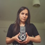 Portrait of Mandyleft holding a rolleiflex camera