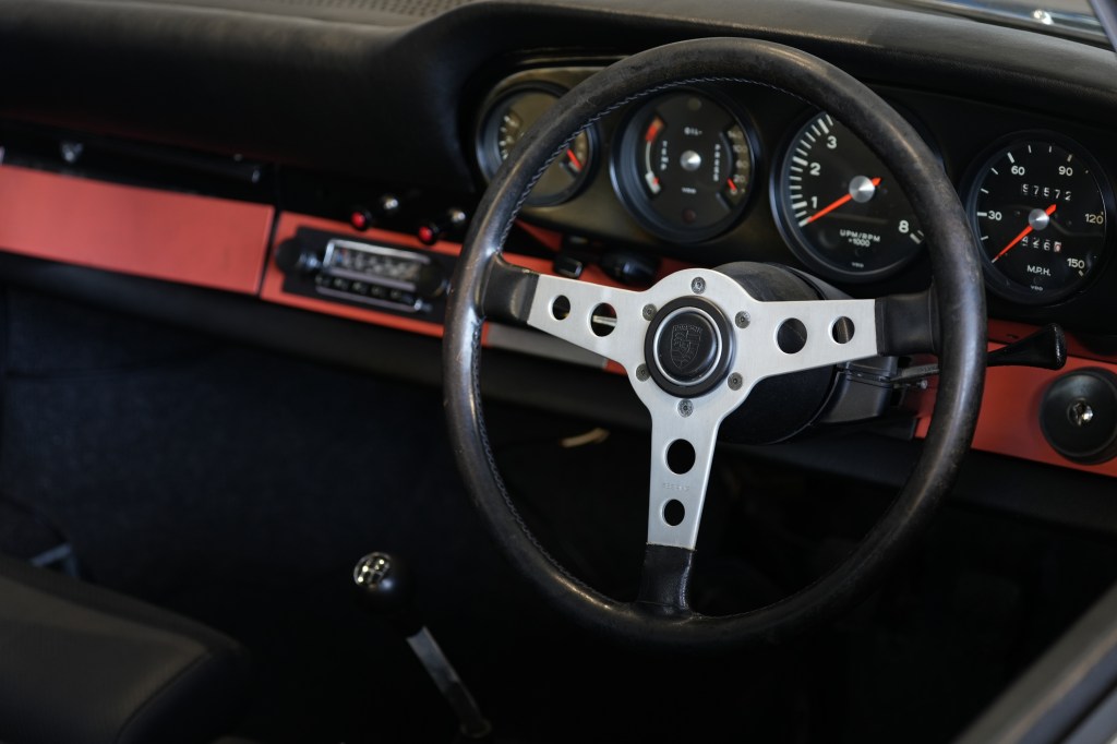 Porsche interior. Sony FE 70-200mm F4 Macro G OSS II sample photo. Copyright Joshua Waller.