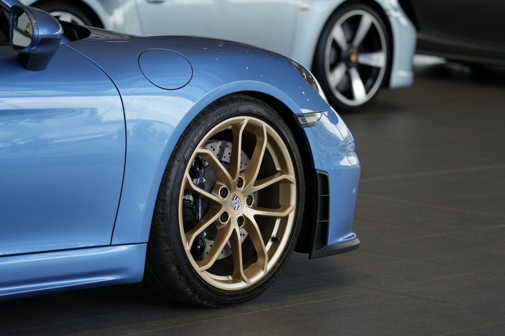 Porsche wheels. Sony FE 70-200mm F4 Macro G OSS II sample photo. Copyright Joshua Waller.
