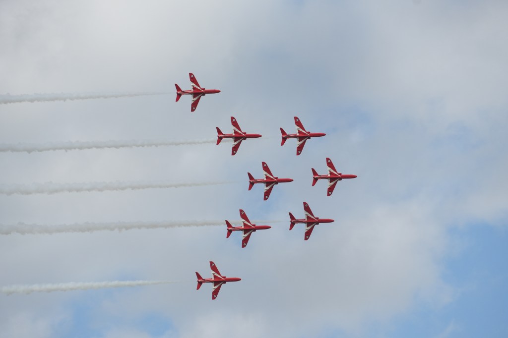 Sony Alpha A6700 eight Red Arrows airplane flying in formation, sample image
