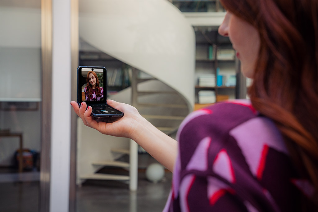 taking a selfie on a flip design phone