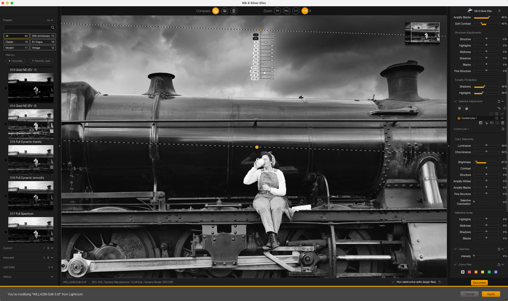 Woman drinking from a tea cup sitting on the side of a steam train. Nik Collection 6 Silver Efex plugin in Photoshop, control lines. 