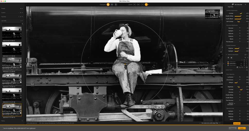 Portrait of a woman drinking from a tea cup sitting on the side of a steam train. Nik Collection 6 Silver Efex plugin in Photoshop control points example.