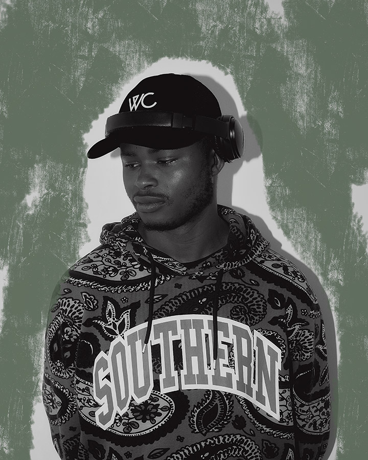 photo of a boy in a baseball cap and hoodie with the word Southern printed on the front