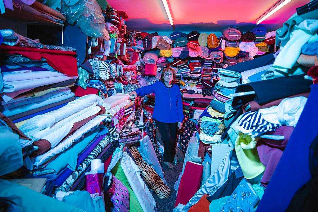 Janet Billington, The Nylon Shop. Janet in the Aladdin’s cave of the Nylon Shop on Two Mile Hill. Open for over 50 years this incredible shop has all kinds of textiles hidden in plain sight. © Khali Ackford