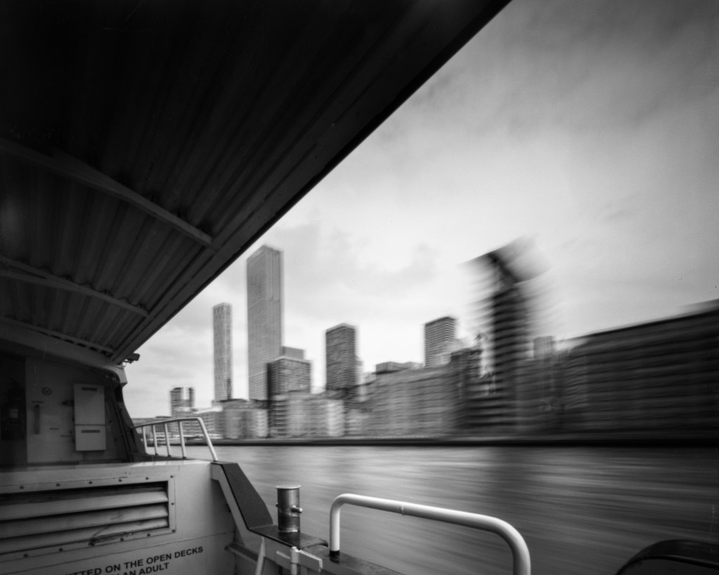 long exposure black and white photo of a city with skyscrapers