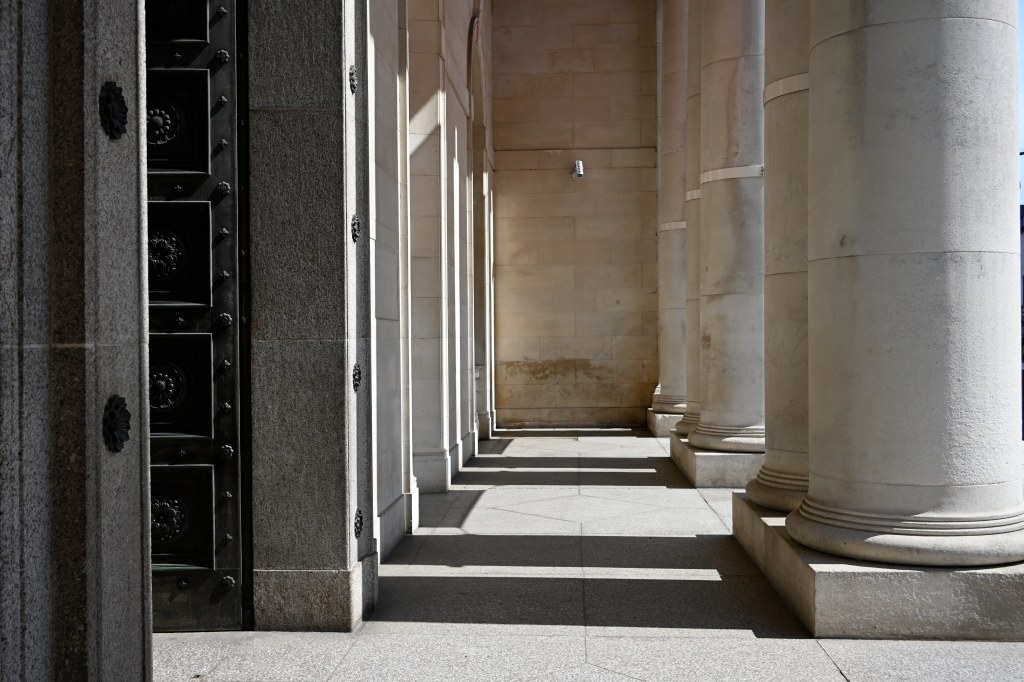 Nikon Nikkor 24mm f/1.7 lens sample image, pillars and entrance to a museum