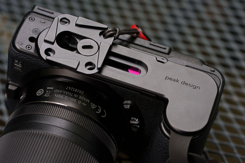 Peak Design Micro Clutch L-bracket version on Nikon Z7 II, with Capture plate and strap connector. 