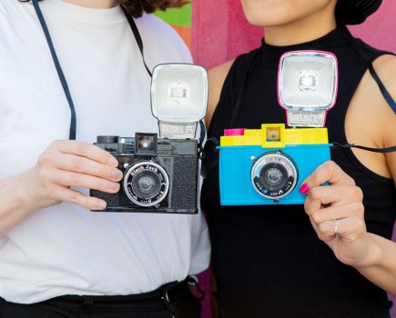 Retro Diana F+ cameras back in stock for less than $100/£100, Diana F+ CMYK Edition and the Diana F+ Black Jack Edition side by side