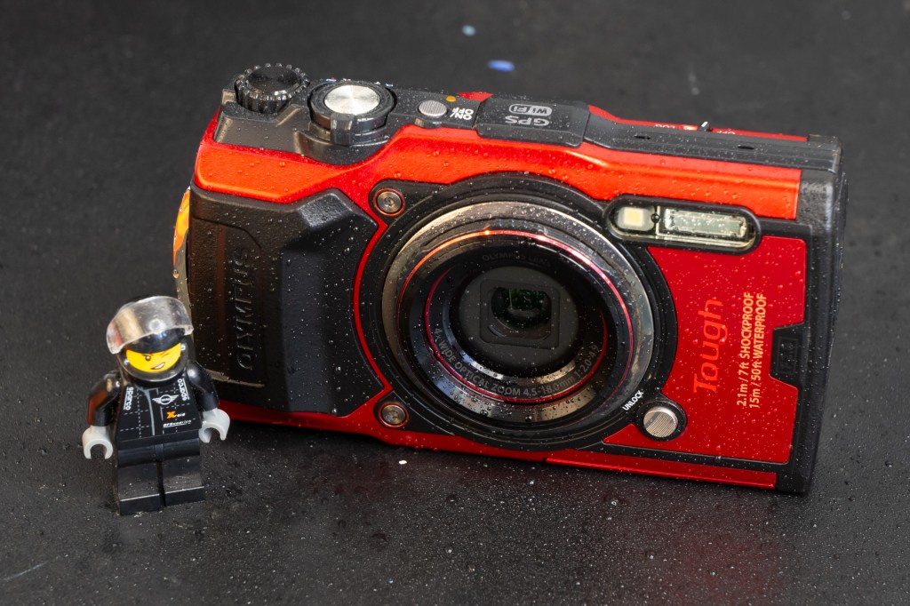 Olympus Tough TG-6 Wet (Red) Lego for scale. Photo Joshua Waller