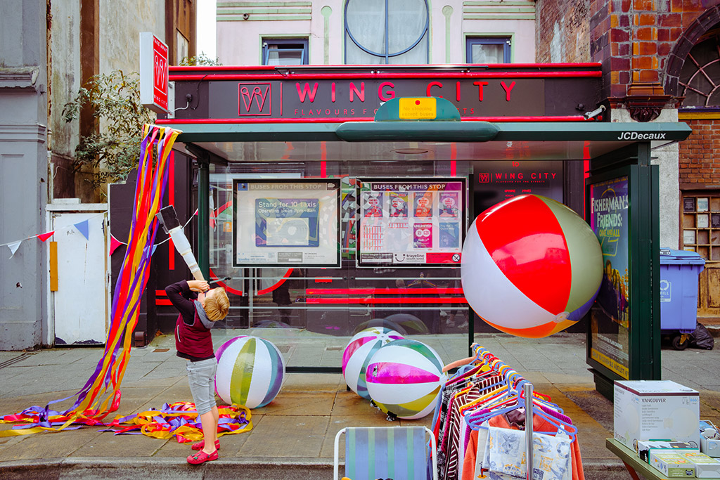 seaside street scene with blow up beach balls