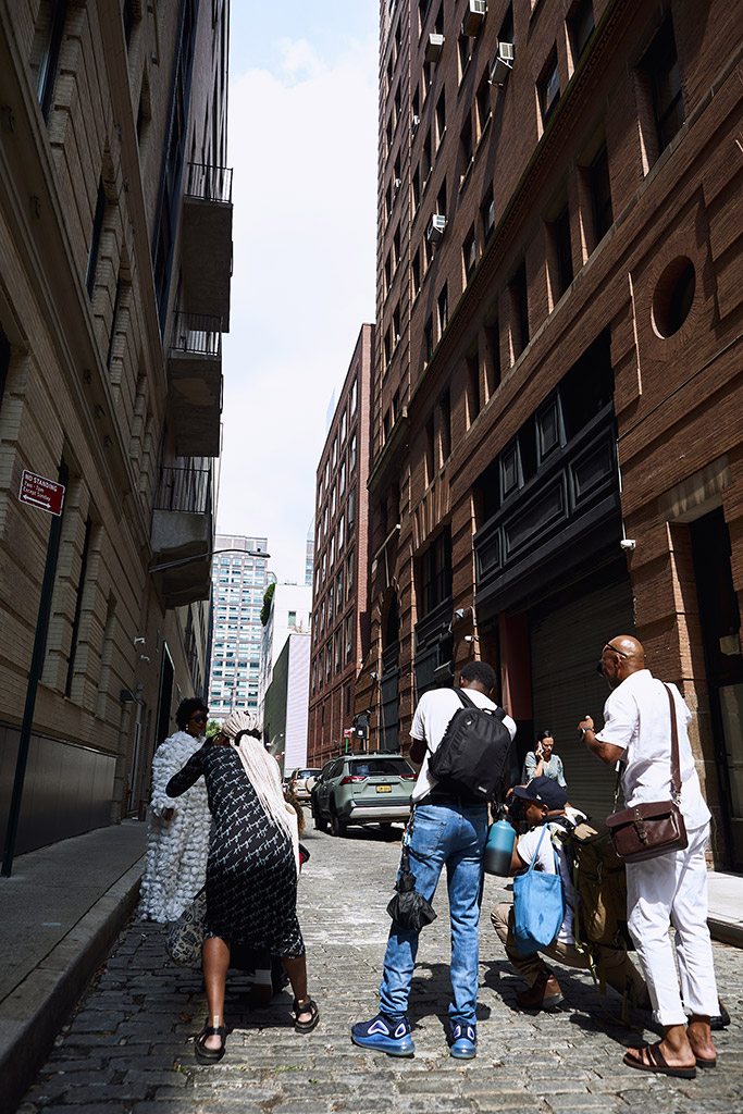 Photographers at Spring Studios capturing street style during fashion week. Photo: Tobi Sobowale