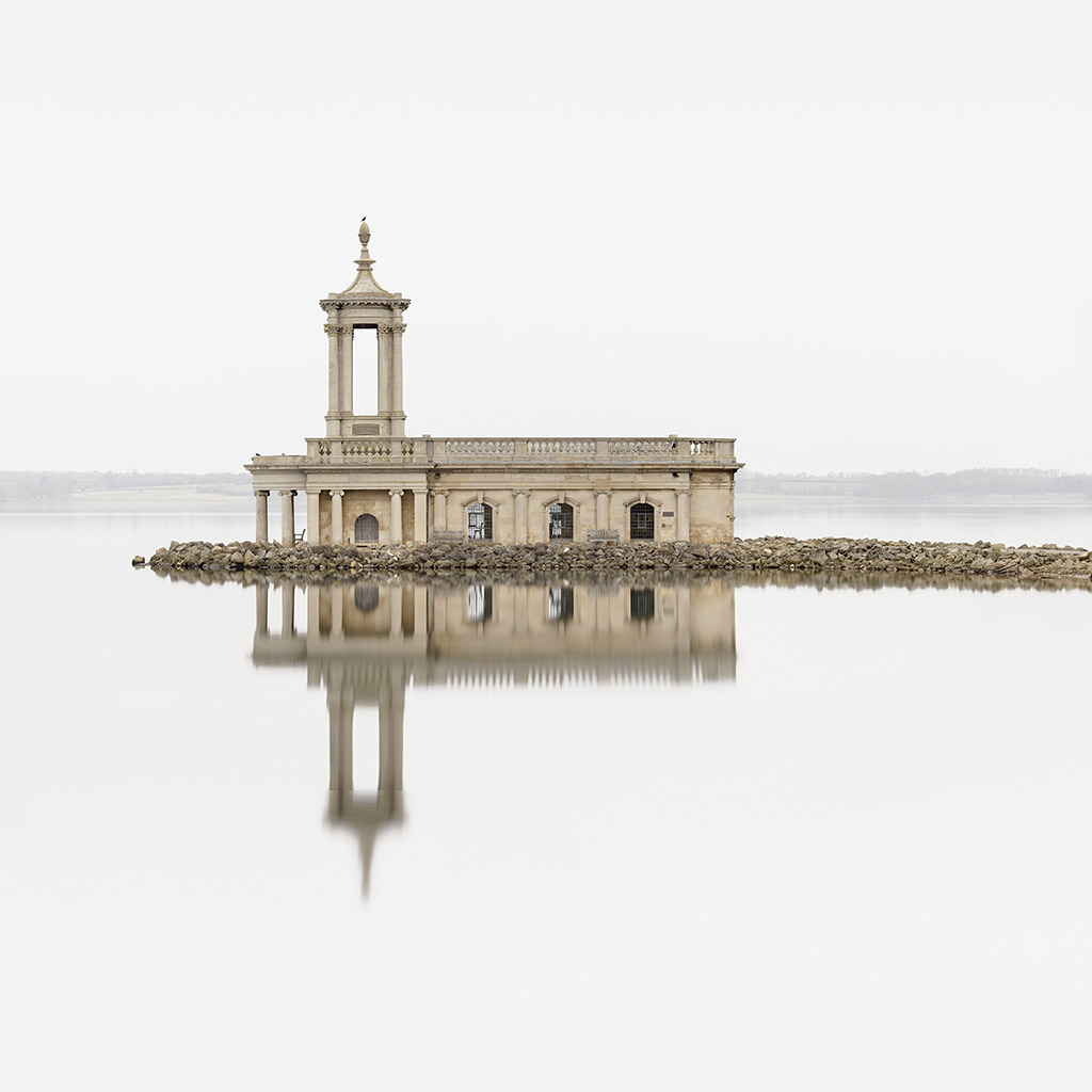 minimalist photograph of normanton church reflected in the water