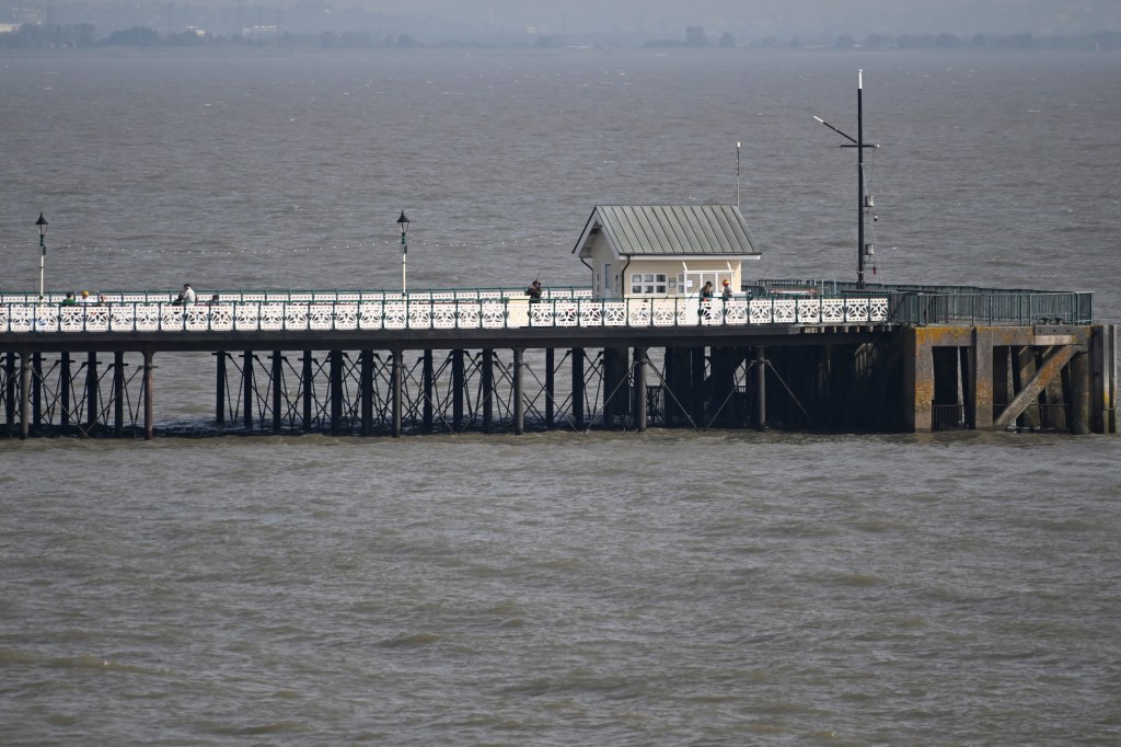 Tamron 70-300mm f4.5-6.3 Di III RXD lens for Nikon Z-mount Sample image, a white pier at the sea