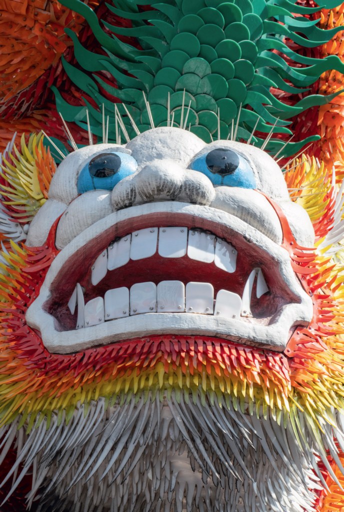 Panasonic Lumic FZ 1000 II Sample image. Close up of a colourful asian lion figure's head.
