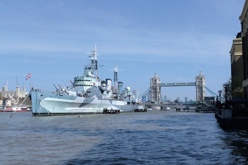 Panasonic Lumic FZ 1000 II Sample image. Bright blue skies, the HMS Belfast warship on the Themes in London, with the Tower Bridge in the background.