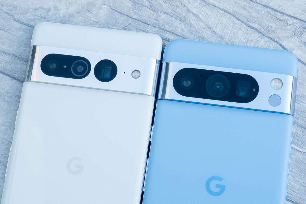 Google Pixel 8 Pro with a blue cover (right) vs the Google Pixel 7 Pro with a white cover
