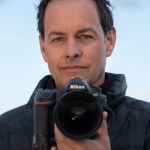portrait of Marsel van Oosten with his Nikon camera