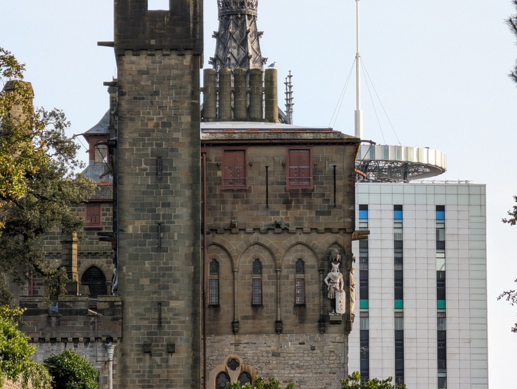 Google Pixel 8 Pro 10x digital zoom sample image, castle turret with a modern office building in the background