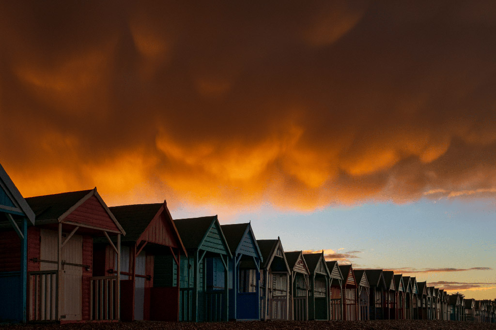 Young Weather Photographer of the Year winner, Jamie McBean, whose winning photo captures a heavy swathe of unusual, bulbous, mammatus clouds at sunset, hanging low over a row of beach huts, following a thunderstorm at Herne Bay in Kent.