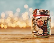 Money jar with coins. Getty Images