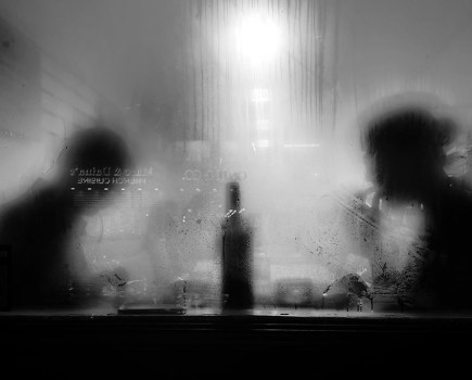 two people at a restaurant view through steamed rainy window iphone 13 pro image by zahyr caan