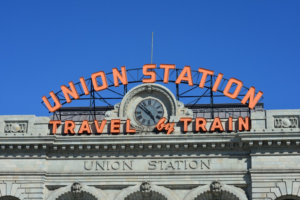 Union station's old fashioned orange sign in Denver 