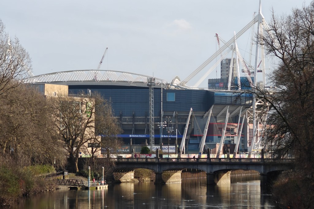 One Plus 12 sample image, zoom 6x, a bridge and a modern building that appears to be a shopping centre