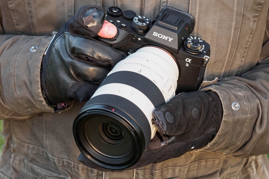 Sony Alpha A9 III in-hand with gloves