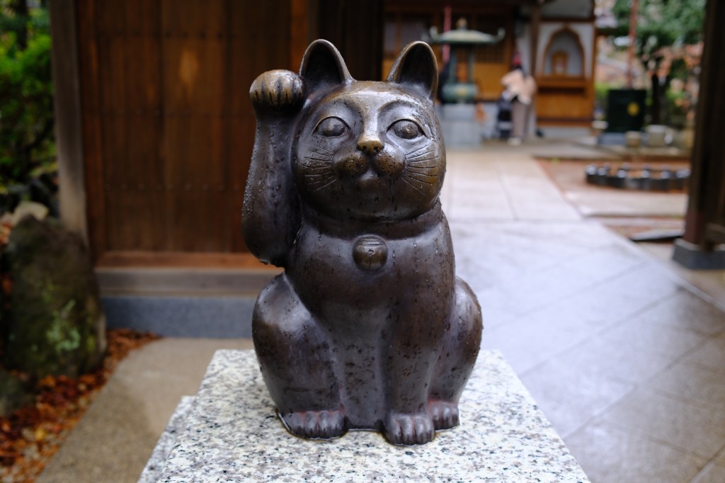 A cat statue, taken in Japan. Photo Joshua Waller