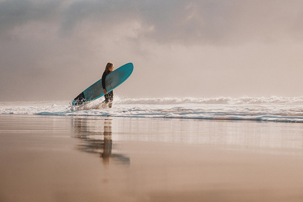 surfer on the shoreline