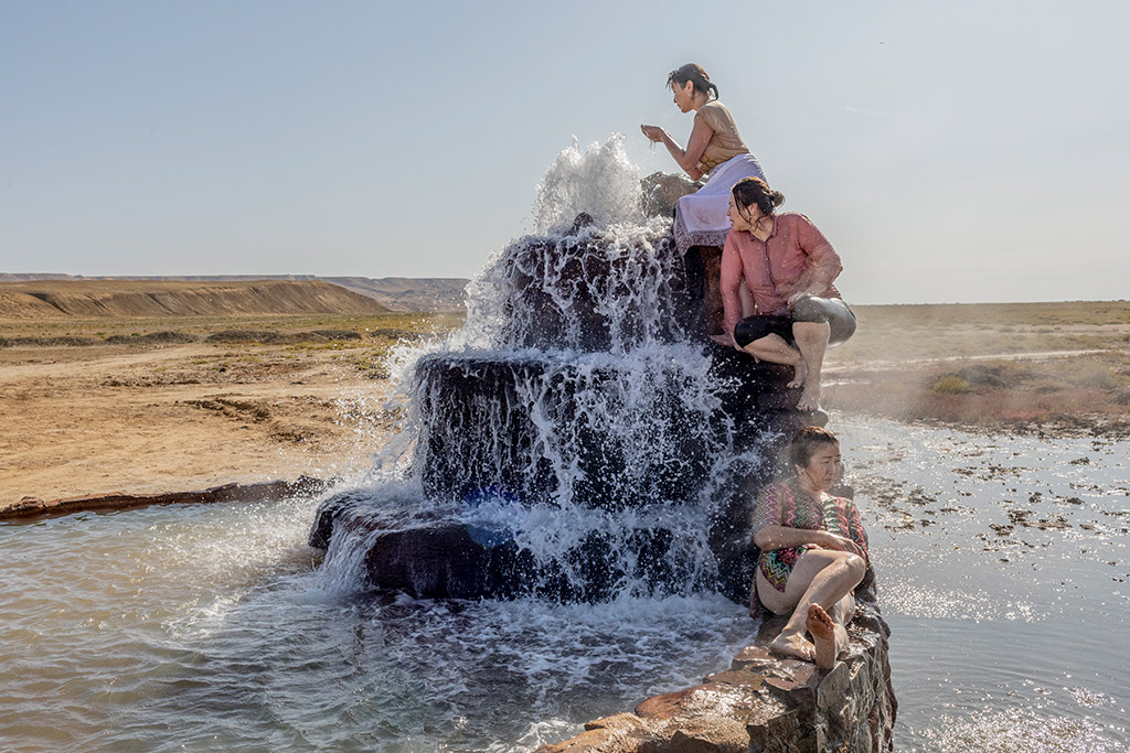 Women visit a hot spring that has emerged from the dried bed of the Aral Sea, near Akespe village, Kazakhstan, on 27 August 2019. Once the world’s fourth-largest lake, the Aral Sea has lost 90 percent of its content since river water has been diverted.