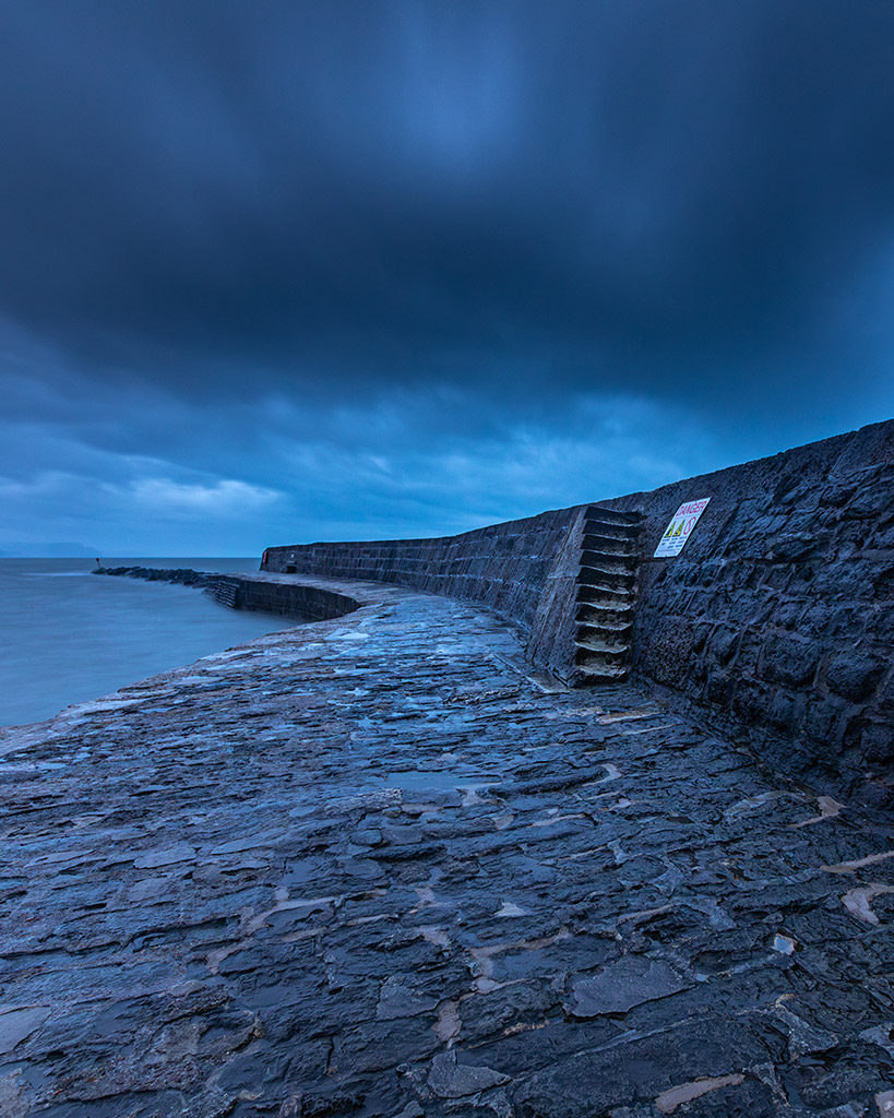Long exposure of the famous Cobb at Lyme Regis, taken during blue hour
