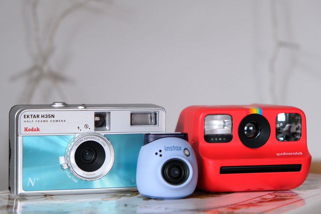 Polaroid Go Generation 2 with other tiny cameras, the Kodak Ektar H35N and Instax Pal.