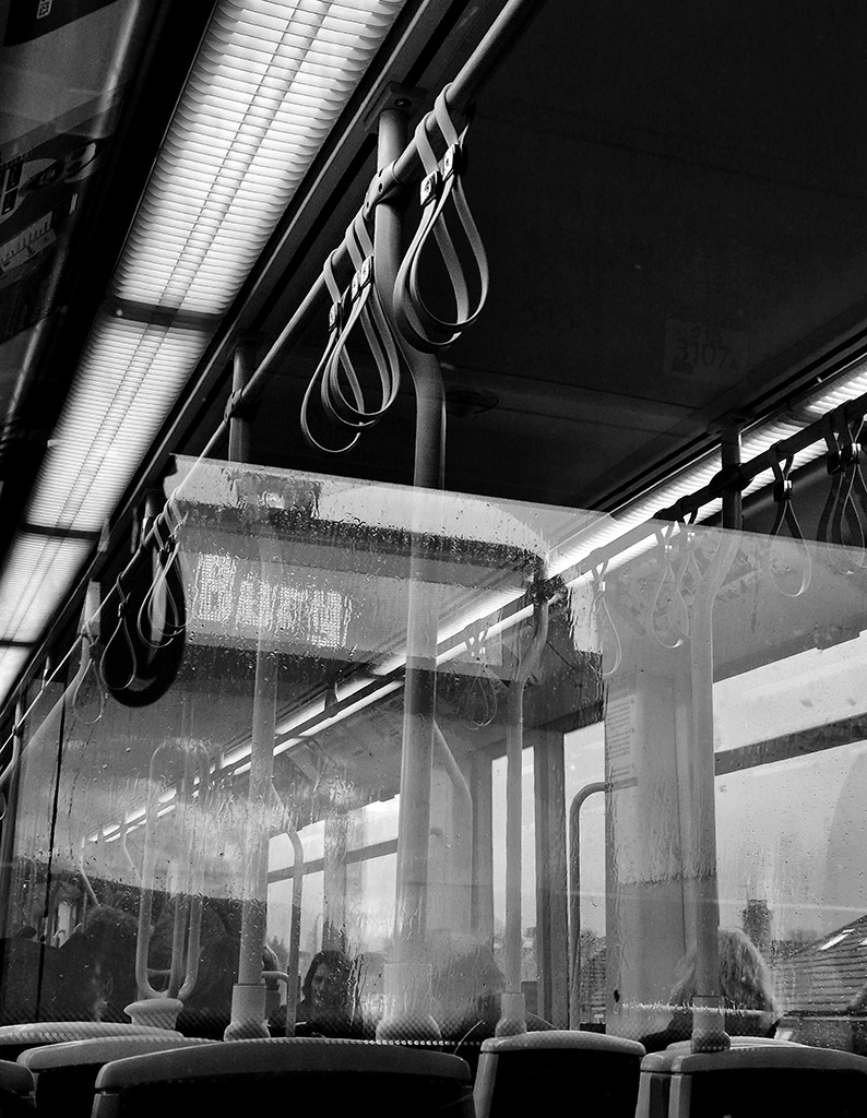 reflections in manchester tram smartphone photo