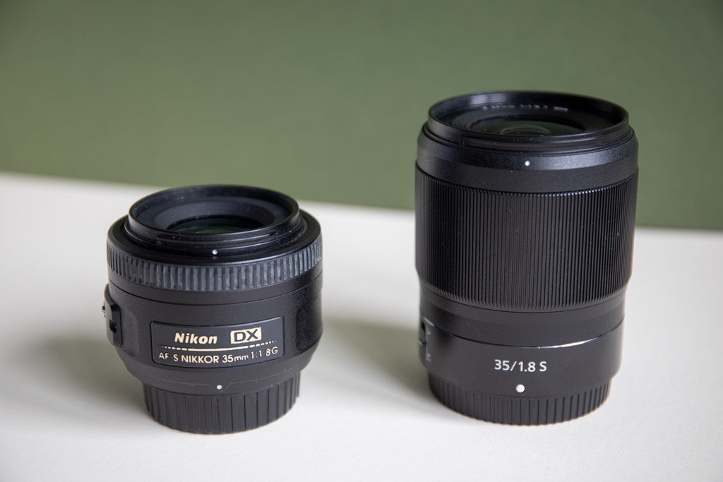 Nikon 35mm DX f/1.8 on the left and the Nikon Nikkor Z 35mm f/1.8 lens on the right. Switch to mirrorless