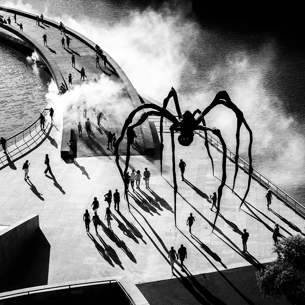 Taken in Bilbao, high contrast scene of a Louise Bourgeois spider sculpture second place apoy black and white