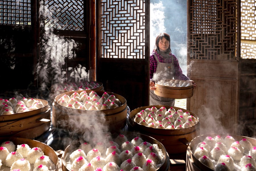 Chinese photographer Zhonghua Yang has been crowned Overall Winner of Pink Lady® Food Photographer of the Year 2024 and awarded the prize of £5,000 (GBP) for his image Red Bean Paste Balls. The photo captures a woman entering a room to add her latest creation to a mountain of steaming dim sum, all prepared for a feast to celebrate Lunar New Year.