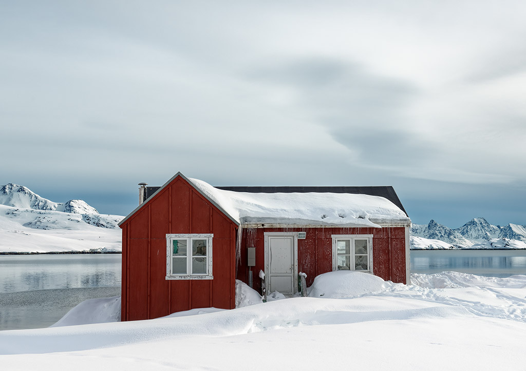 Architecture Winner: Tiina Itkonen Image (Finland), Series: Home © Tiina Itkonen red building in a snowy ice landscape