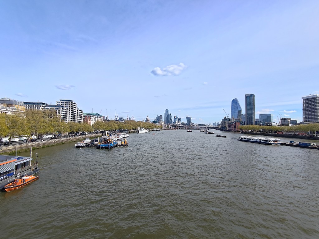 river thames and view towards st pauls and skyscrapers ultrawide camera