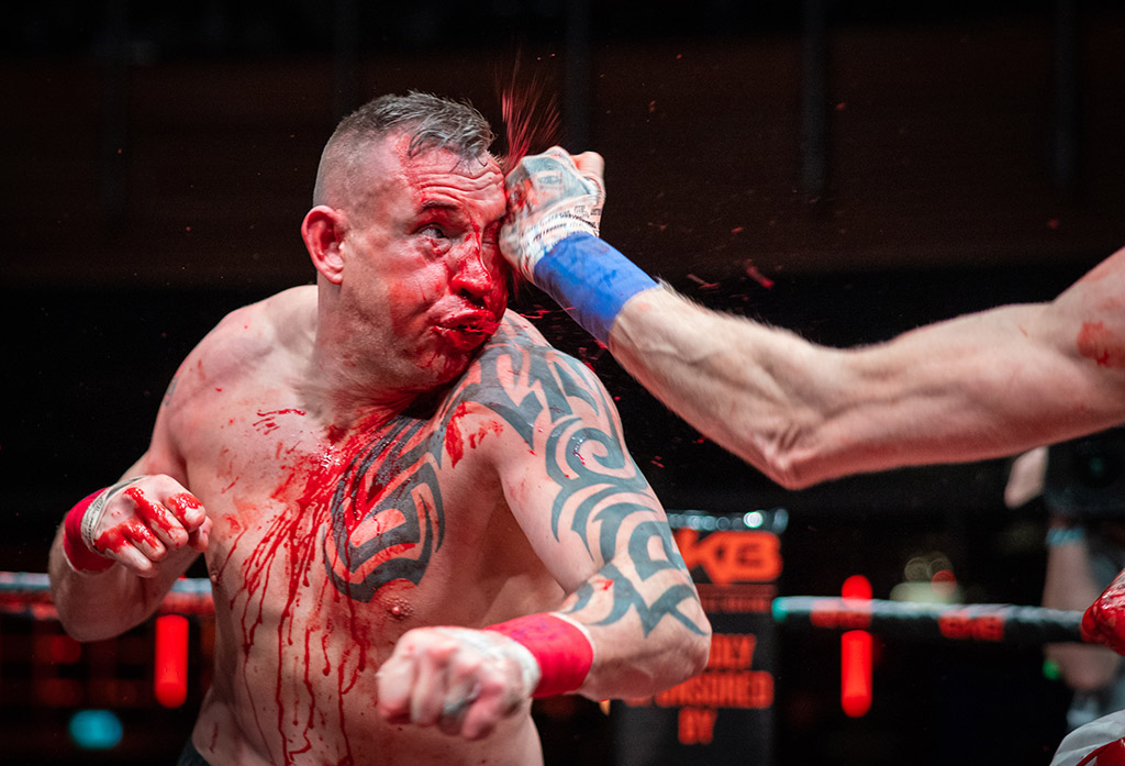 bare knuckle fighter Richie Samuels (left) is struck by a blow from his opponent Tyrone Eliffe in January 2024. Image: Nick Ledger